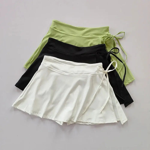 aster quick-dry black tennis skirt with pockets and side slit for active women