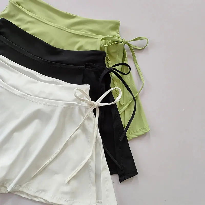 aster quick-dry black tennis skirt with pockets and side slit for active women