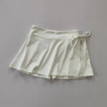 aster quick-dry black tennis skirt with pockets and side slit for active women