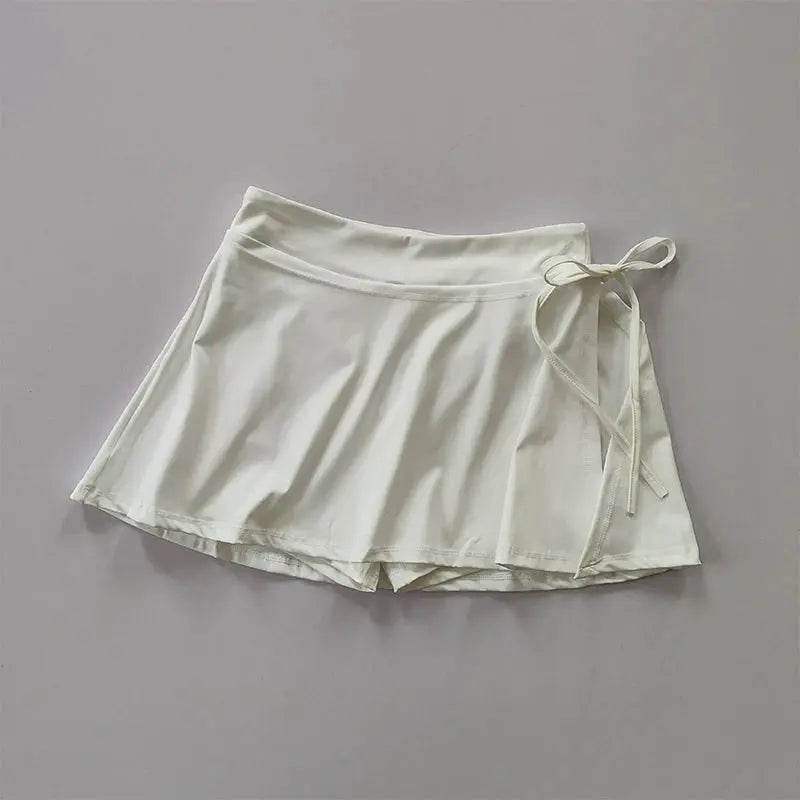 aster quick-dry black tennis skirt with pockets and side slit for active women