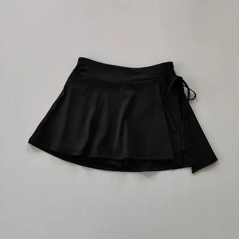 aster quick-dry black tennis skirt with pockets and side slit for active women