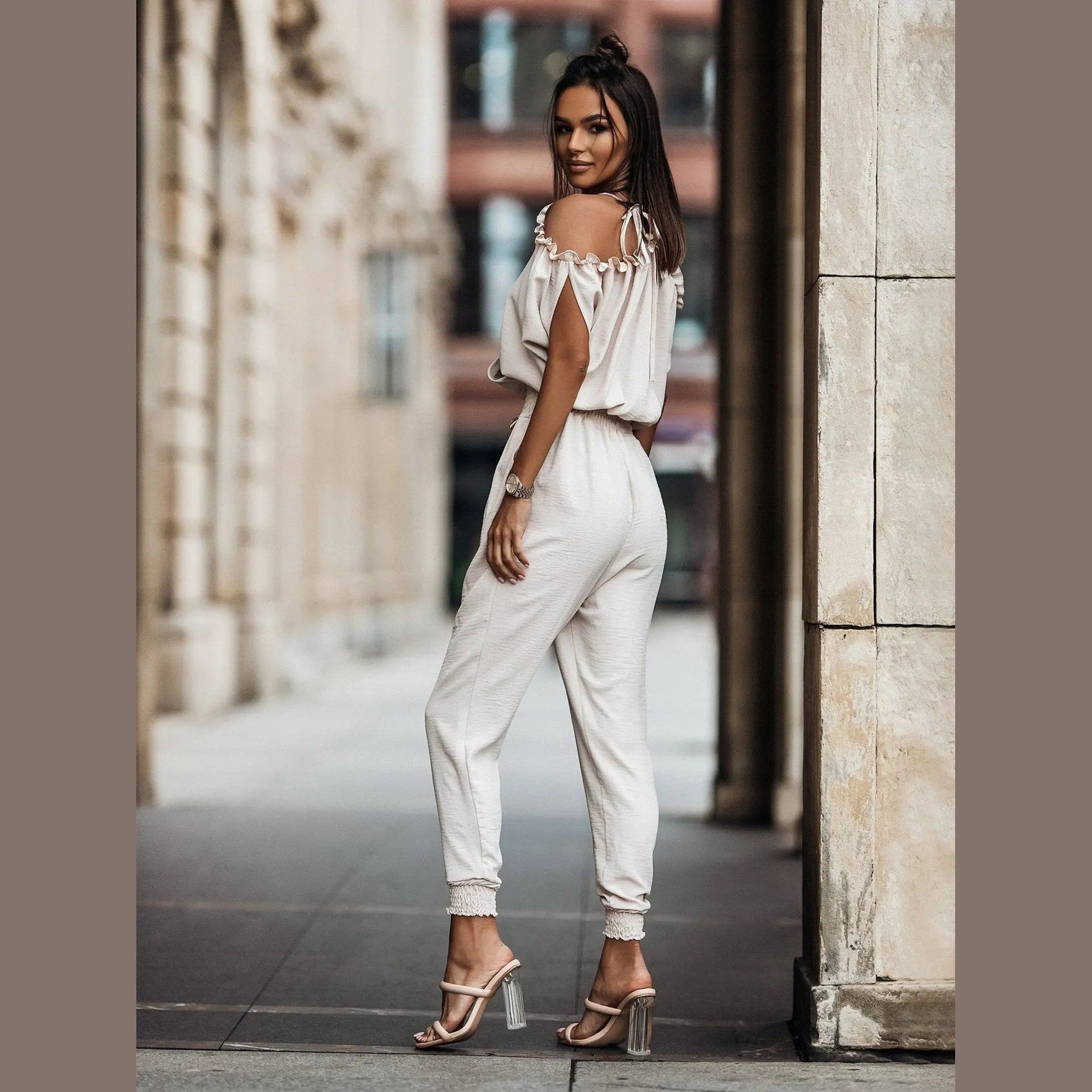 nova elegant white jumpsuit with open shoulders for glamorous and casual looks