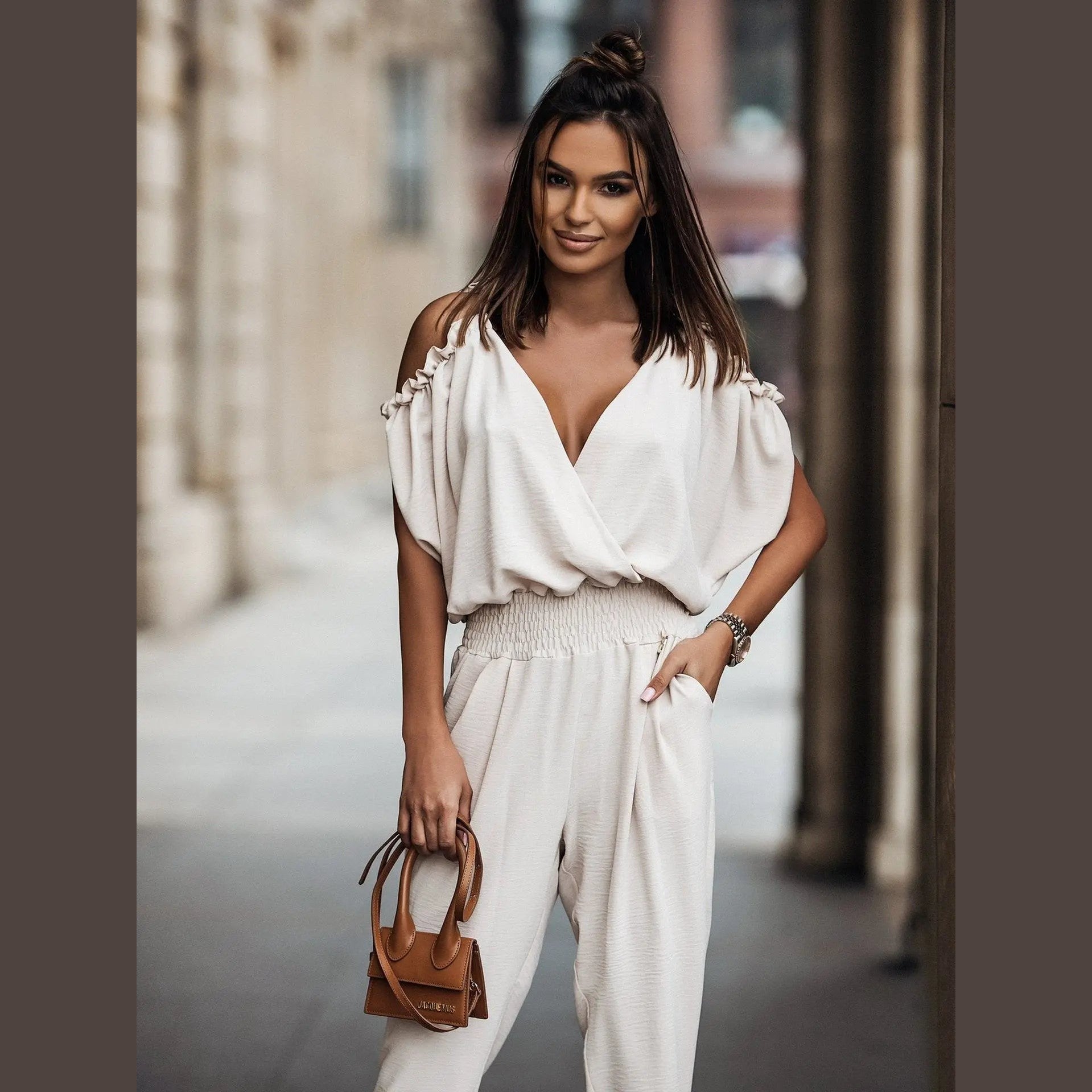 nova elegant white jumpsuit with open shoulders for glamorous and casual looks